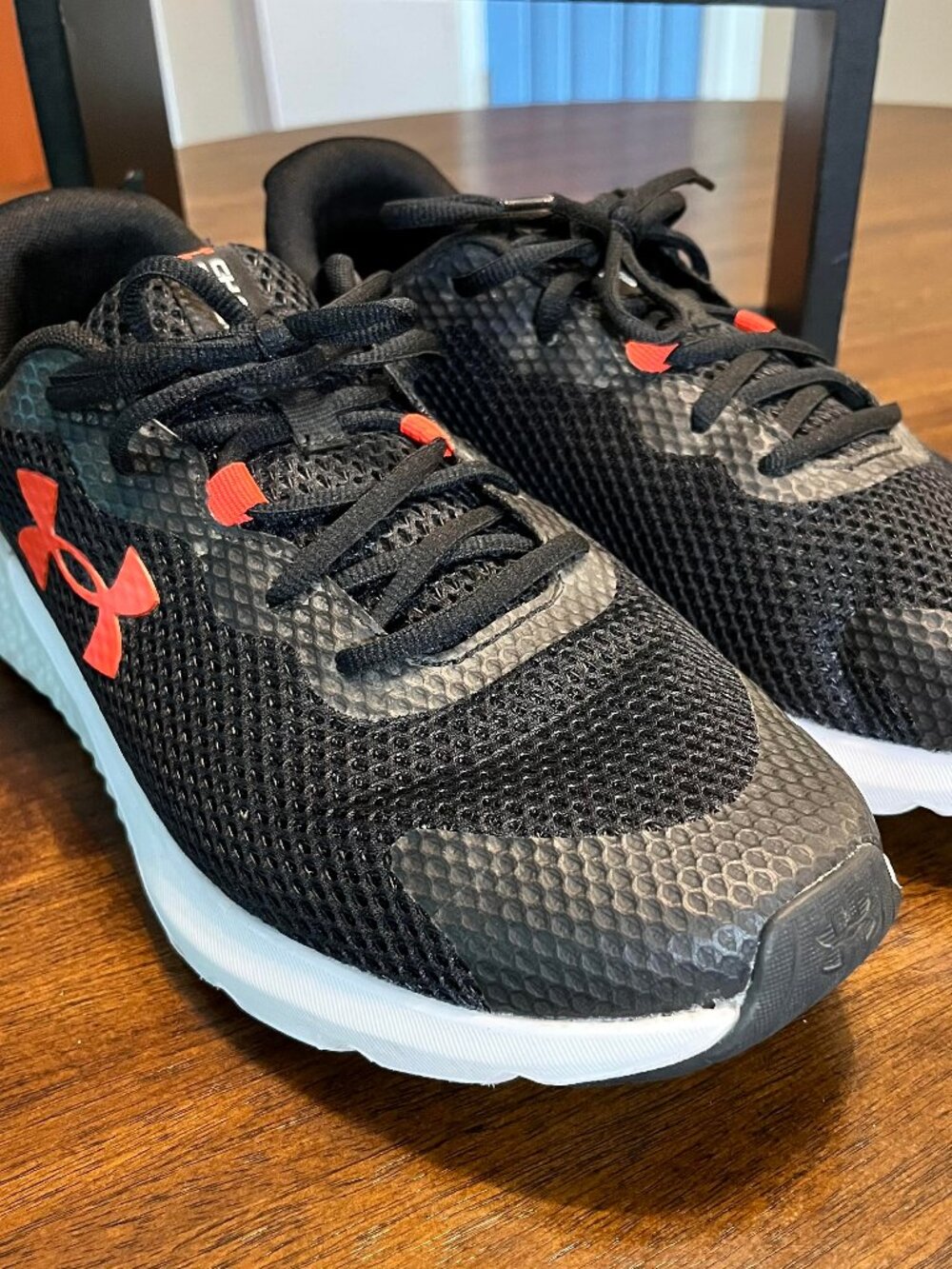 Size 11 Men's Black and Red Under Armour Charged Rogue Running Shoes